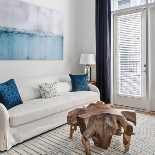 Gorgeous natural light in your living space a living room with a couch and a table