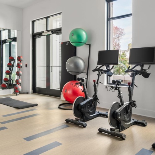 Get your workout on a room with exercise equipment